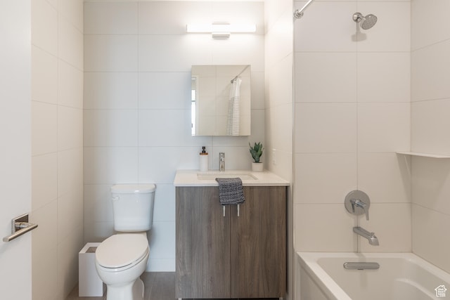 2303 Deer Hollow Rd Unit 1114, Park City, UT 84060 - full bathroom featuring vanity, shower / bathing tub combination, toilet, and tile walls