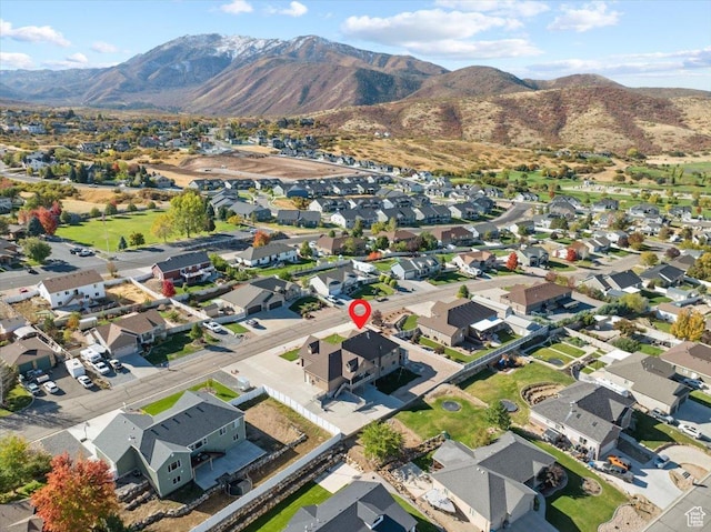 51 E Magellan Ln, Elk Ridge, UT 84651 - aerial view of property's location featuring a mountainous background and nearby suburban area