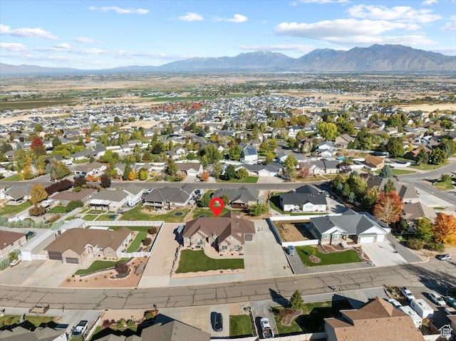 51 E Magellan Ln, Elk Ridge, UT 84651 - aerial view of property and surrounding area with a mountainous background and nearby suburban area