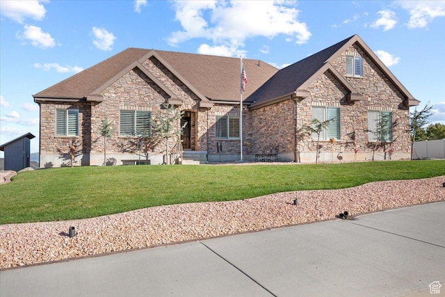 51 E Magellan Ln, Elk Ridge, UT 84651 - view of front of home with stone siding and a front yard