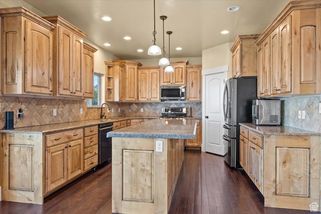 51 E Magellan Ln, Elk Ridge, UT 84651 - kitchen featuring appliances with stainless steel finishes, a center island, decorative backsplash, a sink, and light stone counters