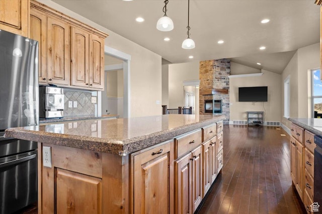 51 E Magellan Ln, Elk Ridge, UT 84651 - kitchen with freestanding refrigerator, vaulted ceiling, decorative backsplash, a kitchen island, and dark wood-type flooring