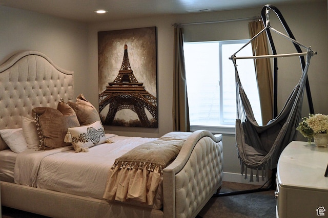 bedroom featuring recessed lighting and dark carpet