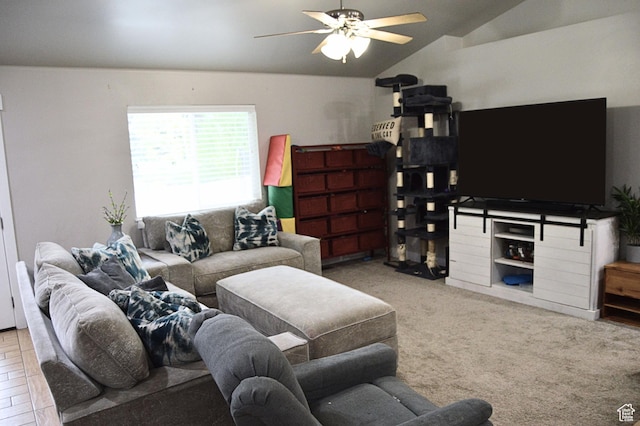 living area with lofted ceiling, carpet, and a ceiling fan