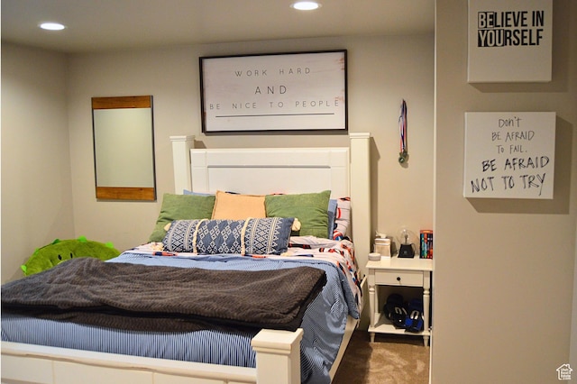 bedroom with recessed lighting and carpet floors