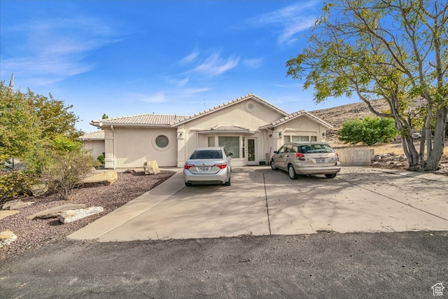 view of front of home with a garage