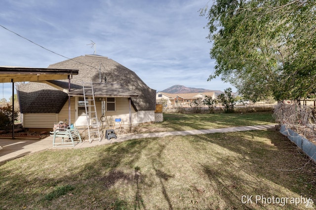 690 E 500 S, Fillmore, UT 84631 - rear view of property with a shingled roof, a patio area, and a yard