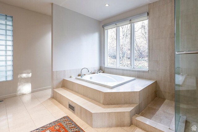 671 N Freeze Creek Cir, Emigration Canyon, UT 84108 - bathroom with tile patterned floors, a garden tub, tiled shower, and recessed lighting