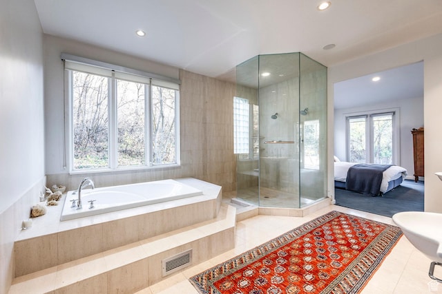 671 N Freeze Creek Cir, Emigration Canyon, UT 84108 - full bathroom featuring healthy amount of natural light, tile patterned floors, a stall shower, recessed lighting, and a bath