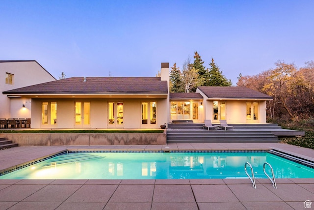 671 N Freeze Creek Cir, Emigration Canyon, UT 84108 - swimming pool featuring a patio area