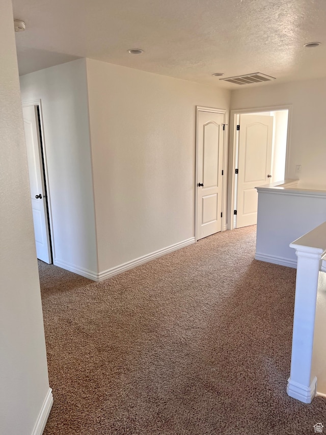 3119 N Sage Loop Unit F3, Lehi, UT 84043 - carpeted spare room featuring a textured ceiling