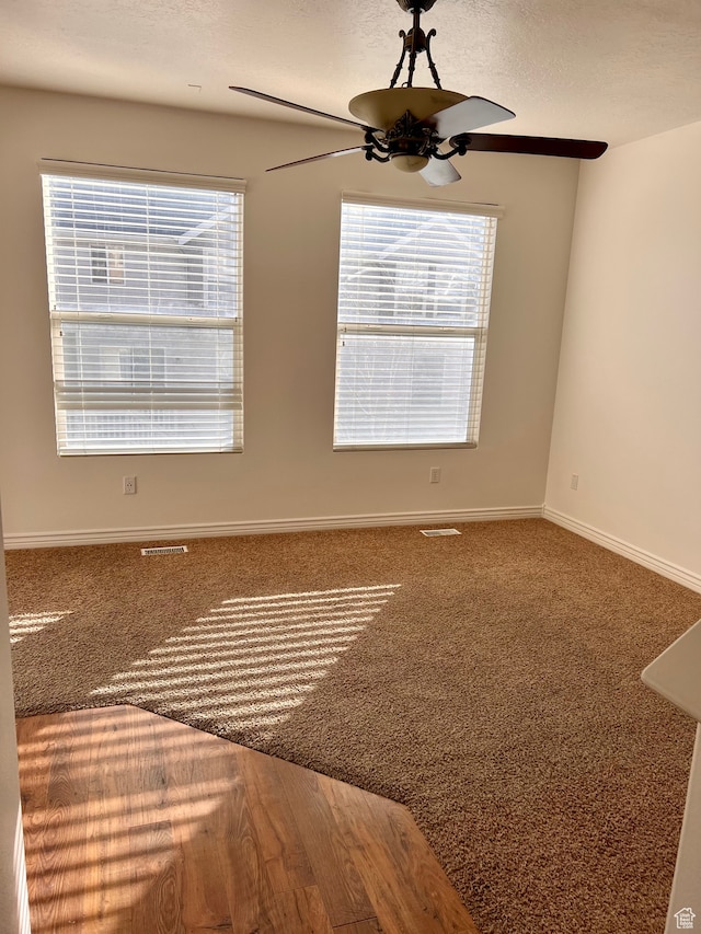 3119 N Sage Loop Unit F3, Lehi, UT 84043 - empty room with ceiling fan, a textured ceiling, and carpet floors