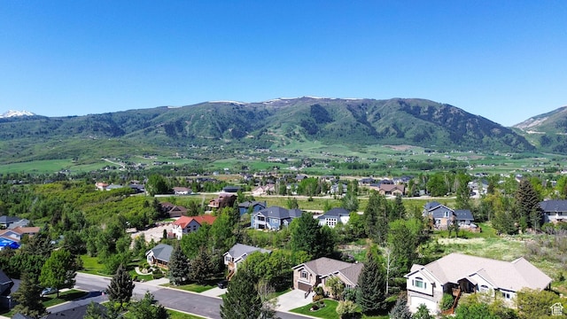 3937 N Patio Springs Dr, Eden, UT 84310 - aerial perspective of suburban area featuring a mountainous background