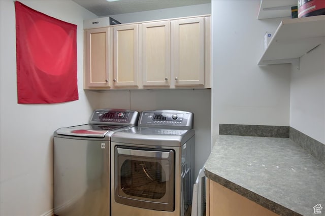 3937 N Patio Springs Dr, Eden, UT 84310 - laundry area featuring cabinets and washer and clothes dryer