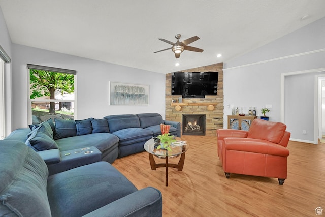 3937 N Patio Springs Dr, Eden, UT 84310 - living room with lofted ceiling, a ceiling fan, light wood-type flooring, and a stone fireplace