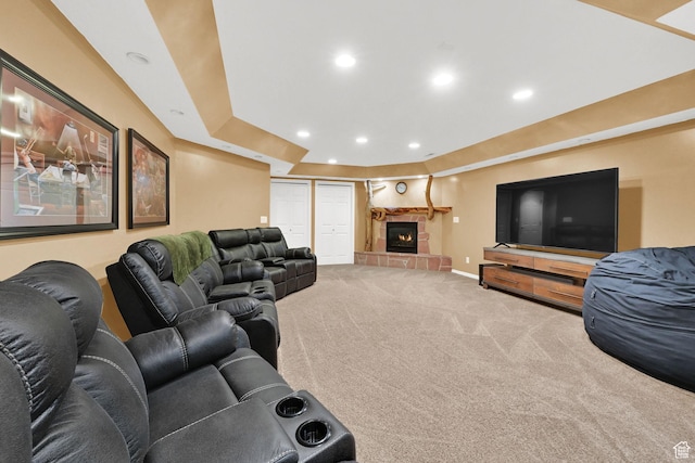3937 N Patio Springs Dr, Eden, UT 84310 - carpeted living area with a raised ceiling, baseboards, recessed lighting, and a tiled fireplace