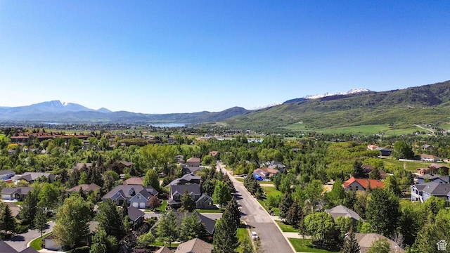 3937 N Patio Springs Dr, Eden, UT 84310 - aerial perspective of suburban area with mountains