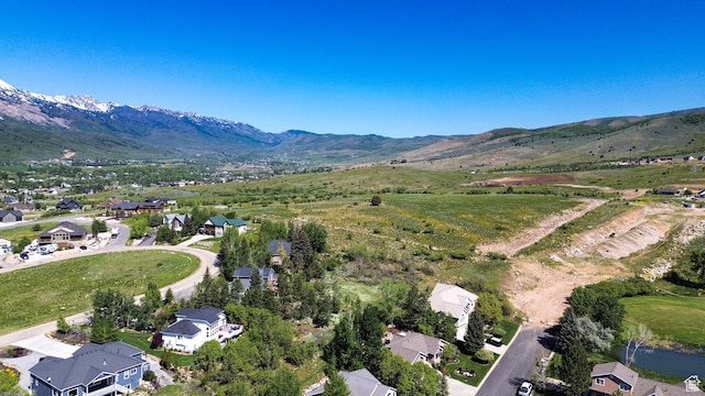 3937 N Patio Springs Dr, Eden, UT 84310 - aerial overview of property's location with mountains and nearby suburban area