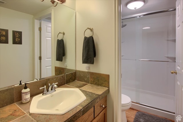 3937 N Patio Springs Dr, Eden, UT 84310 - bathroom with a shower with door, vanity, and toilet