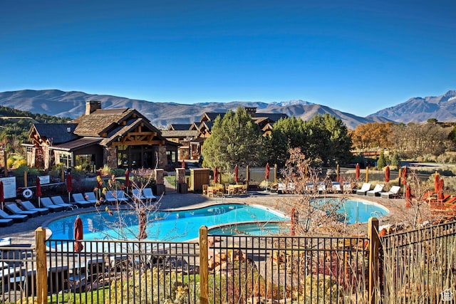 2121 E Flat Top Mountain Dr Unit 727, Heber City, UT 84032 - view of swimming pool featuring a mountain view and a patio