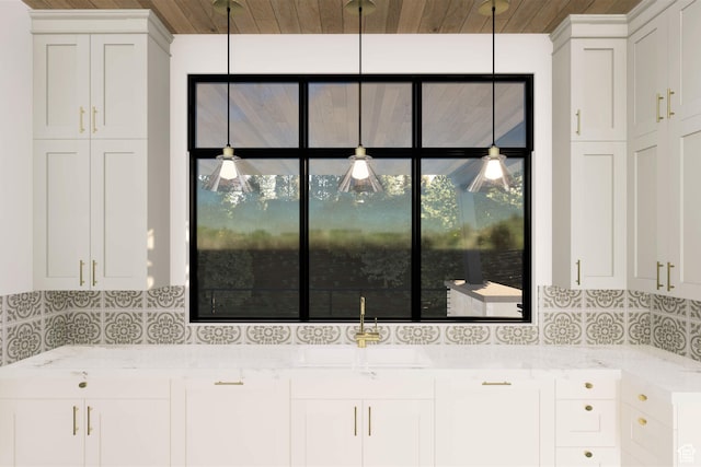 2121 E Flat Top Mountain Dr Unit 727, Heber City, UT 84032 - kitchen featuring decorative backsplash, white cabinets, light stone countertops, and sink