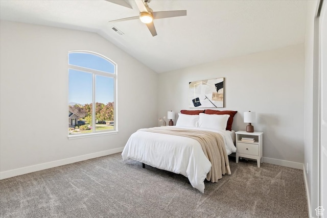 bedroom with vaulted ceiling, carpet floors, and ceiling fan