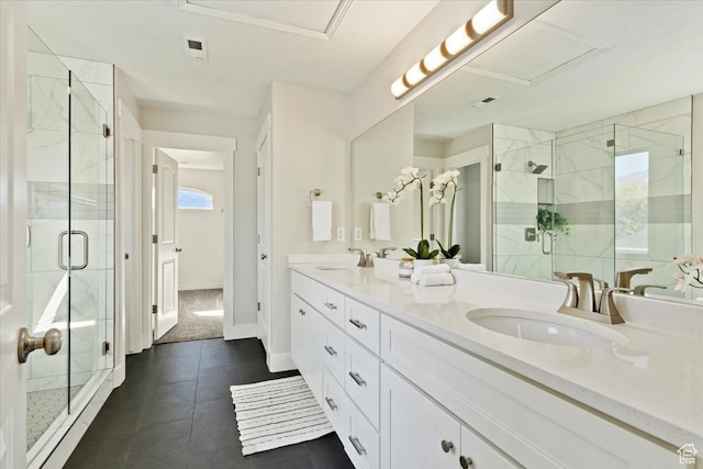 bathroom featuring vanity, tile patterned floors, and walk in shower
