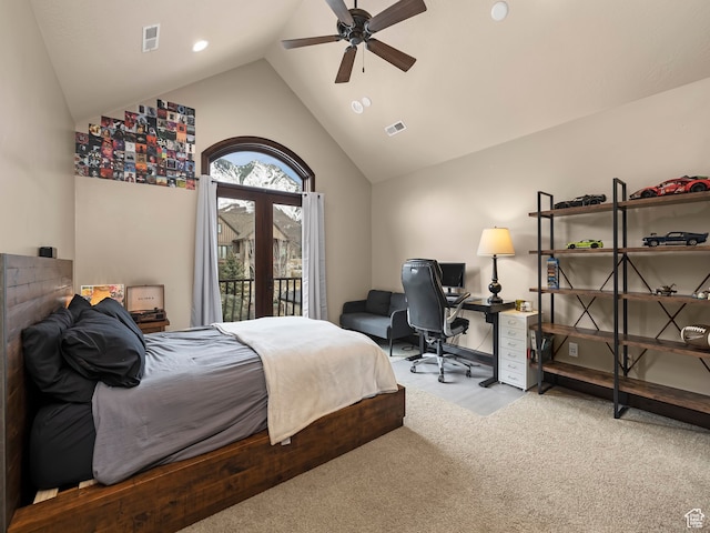 carpeted bedroom featuring ceiling fan, access to exterior, and lofted ceiling