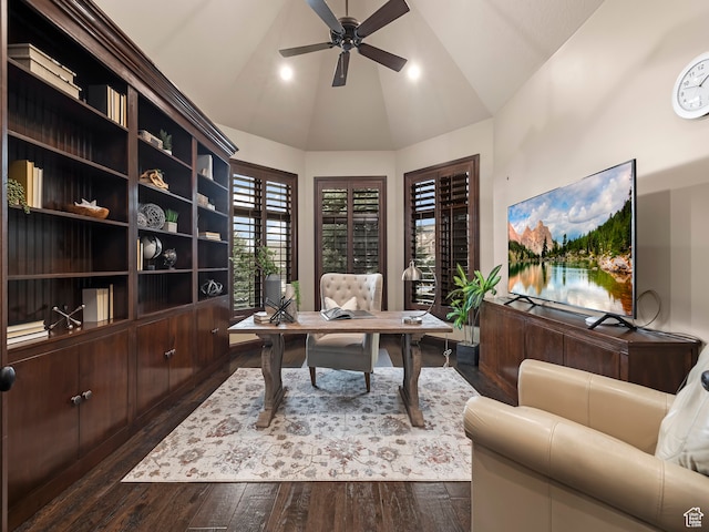 home office featuring ceiling fan, dark hardwood / wood-style floors, and lofted ceiling