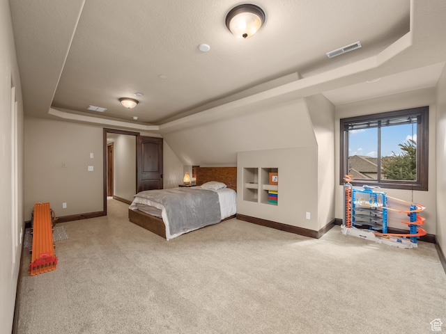bedroom with light carpet