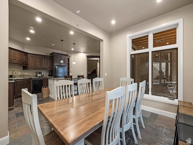 dining room featuring sink