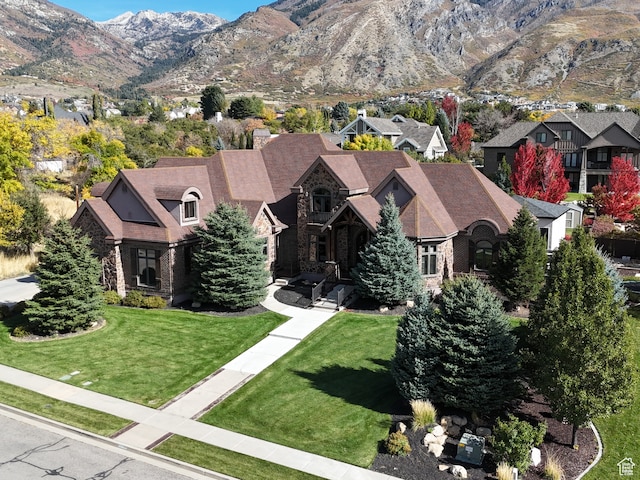 drone / aerial view featuring a mountain view