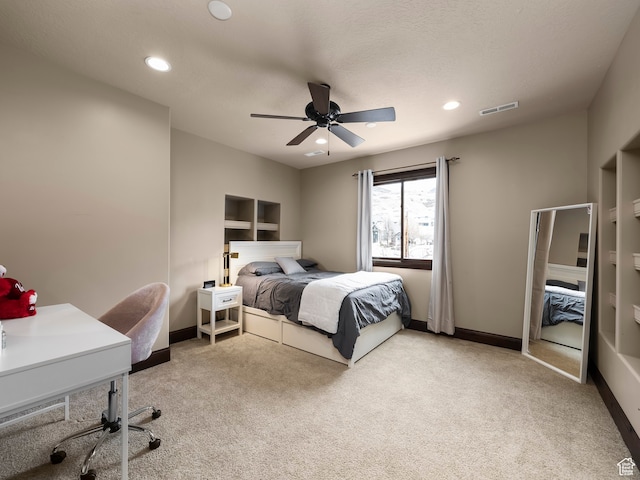 bedroom featuring ceiling fan and carpet flooring