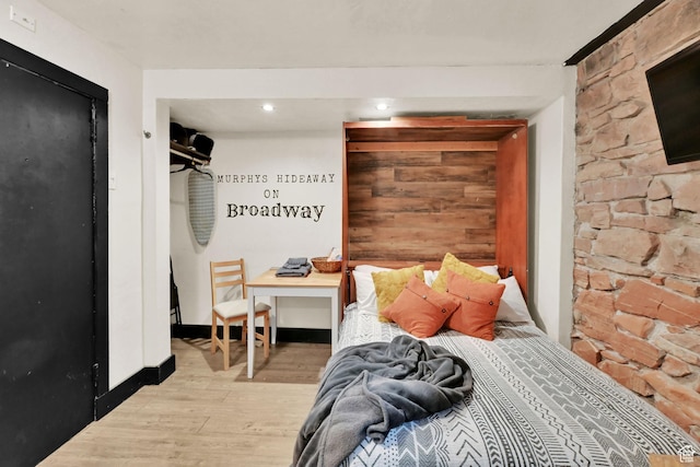 276 E Broadway St S Unit 3, Salt Lake City, UT 84111 - bedroom with light wood-type flooring, recessed lighting, and baseboards
