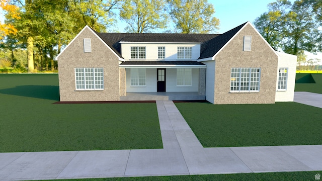 view of front facade with a front lawn
