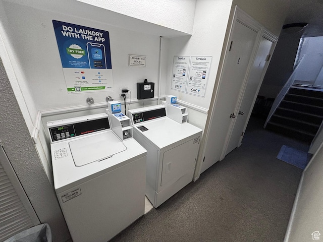 shared laundry area with independent washer and dryer