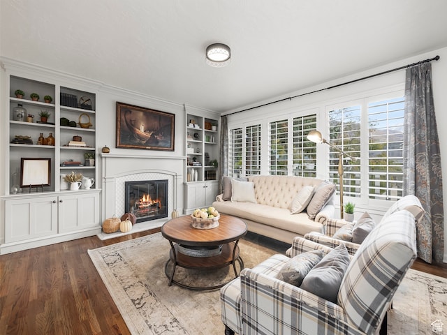 1975 E Gunderson Ln S, Holladay, UT 84124 - living room with built in features and dark hardwood / wood-style flooring