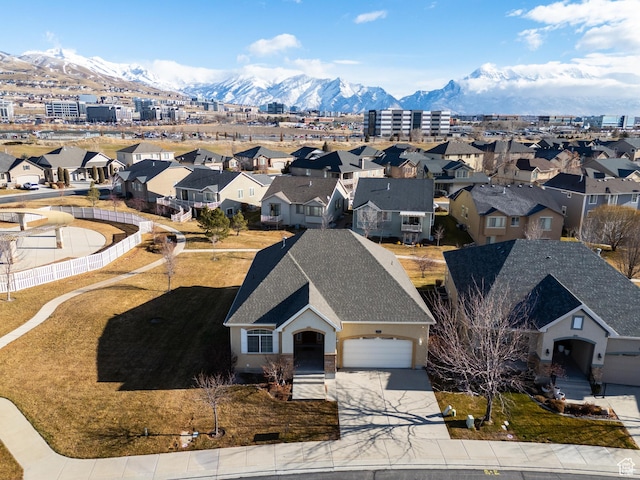 birds eye view of property with a residential view and a mountain view