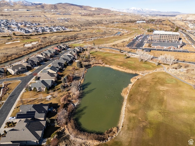 bird's eye view featuring a water and mountain view