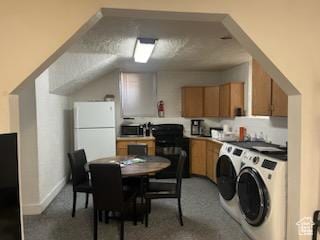 50 W 100 N, Salina, UT 84654 - kitchen with freestanding refrigerator, independent washer and dryer, light colored carpet, stainless steel microwave, and brown cabinets