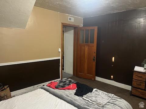 50 W 100 N, Salina, UT 84654 - carpeted bedroom with a textured ceiling and baseboards