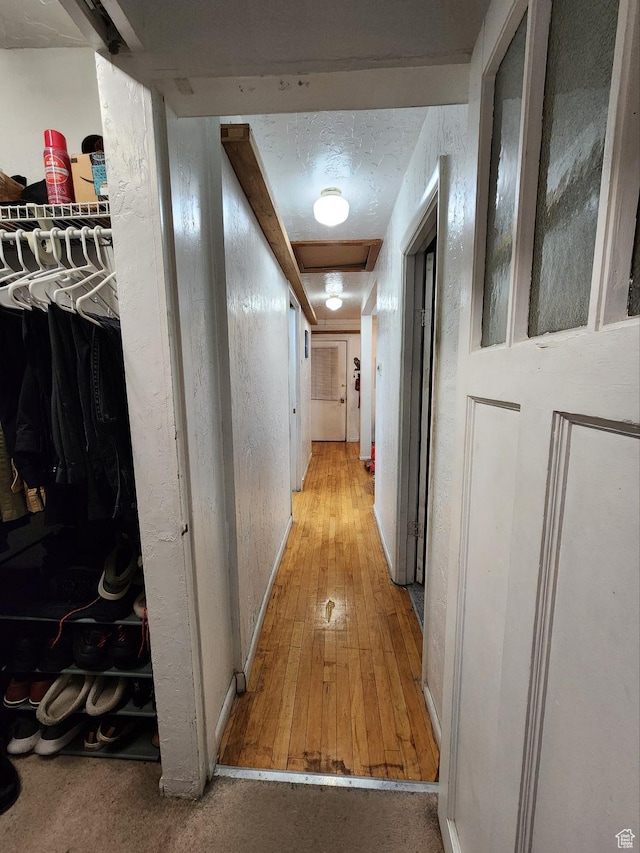 50 W 100 N, Salina, UT 84654 - corridor with light wood-style flooring and a textured ceiling