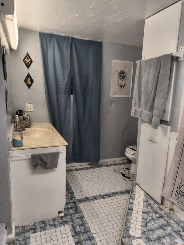 50 W 100 N, Salina, UT 84654 - bathroom with vanity and a textured ceiling