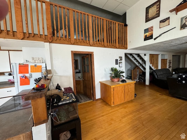 50 W 100 N, Salina, UT 84654 - living area featuring a towering ceiling, hardwood / wood-style floors, and stairway