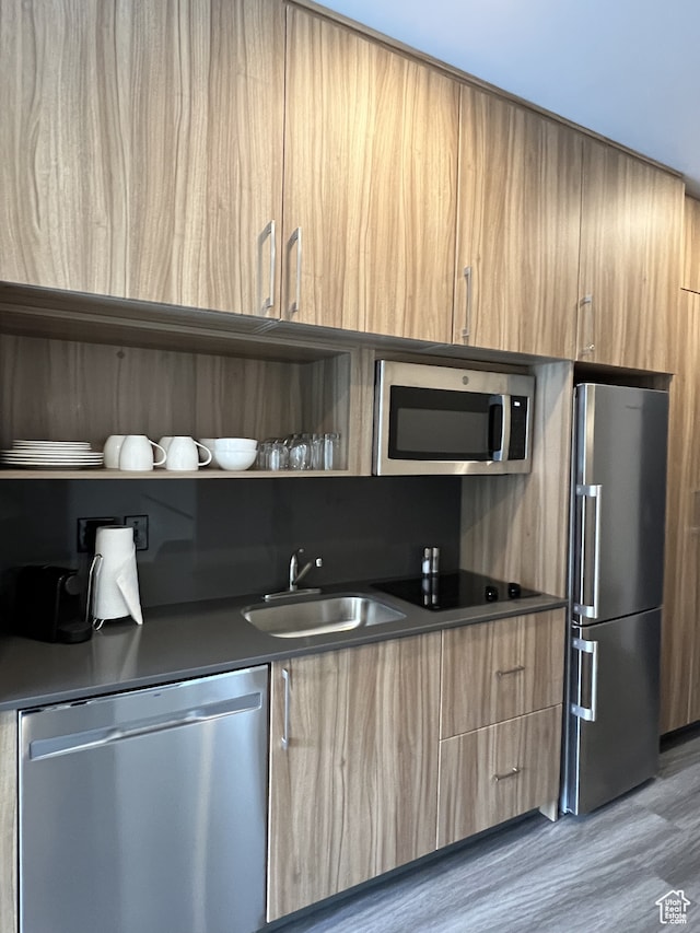 2670 Canyons Resort Dr Unit 218, Park City, UT 84098 - kitchen featuring sink, appliances with stainless steel finishes, and wood-type flooring