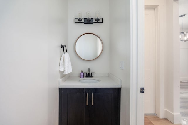 104 S 950 E, Hyde Park, UT 84318 - bathroom featuring vanity and wood finished floors