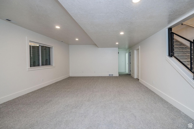 104 S 950 E, Hyde Park, UT 84318 - empty room with recessed lighting, light carpet, a textured ceiling, and baseboards