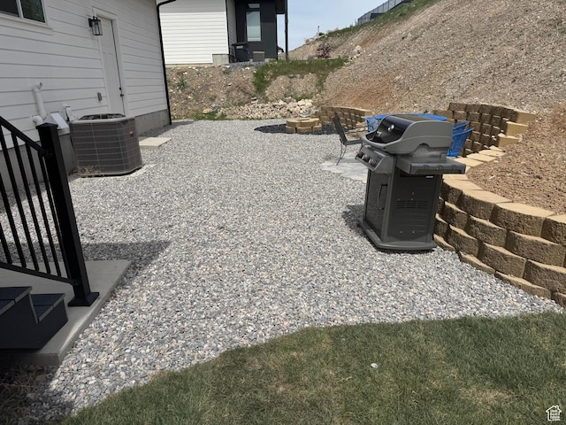 104 S 950 E, Hyde Park, UT 84318 - view of patio featuring central air condition unit and area for grilling