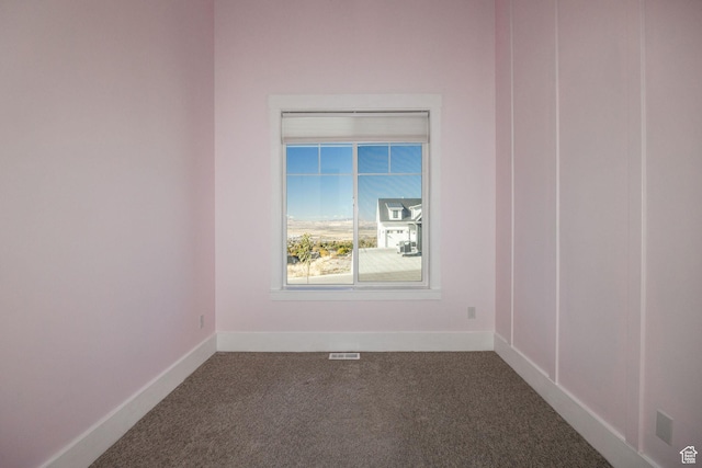104 S 950 E, Hyde Park, UT 84318 - unfurnished room featuring dark colored carpet and baseboards