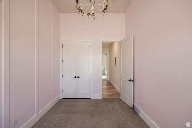 104 S 950 E, Hyde Park, UT 84318 - hall with a chandelier, carpet, and baseboards